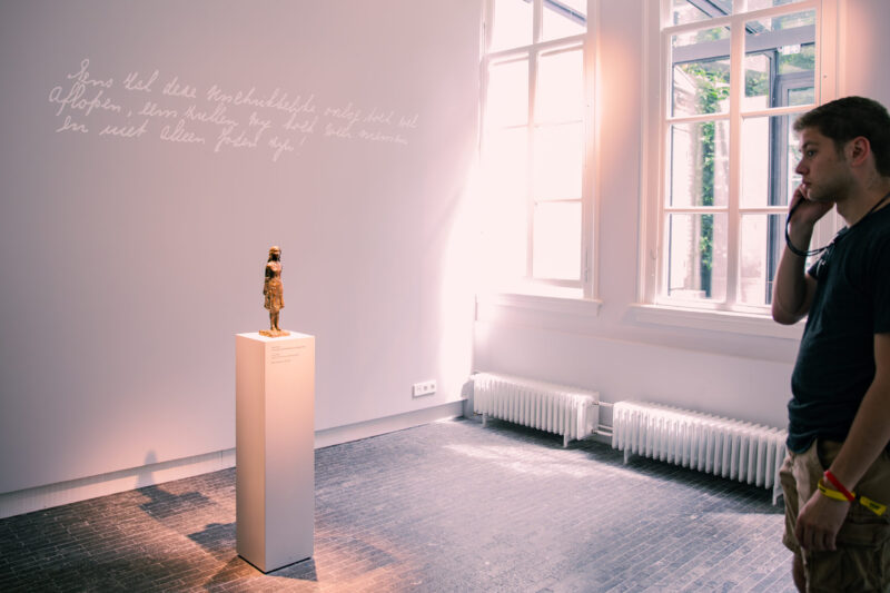 Statue Anne Frank in Anne Frank House