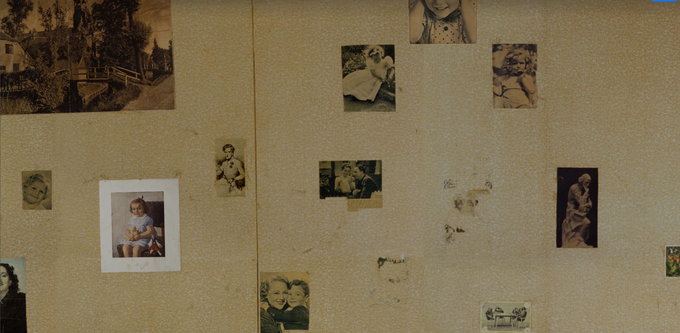 Secret Annex wall photos hung by Anne Frank